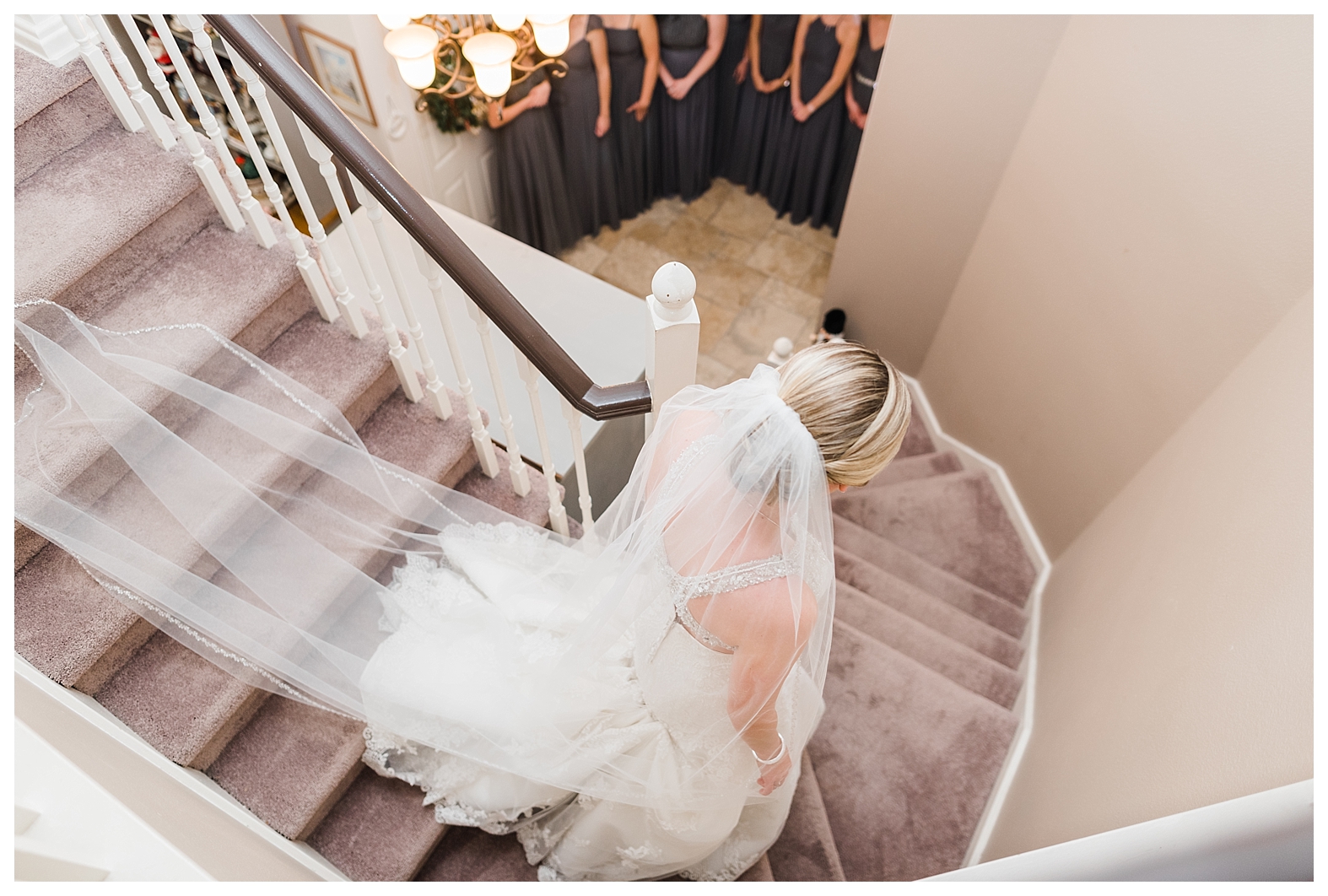 Bride Walking down the stairs for her entrance - J Canelas Photography