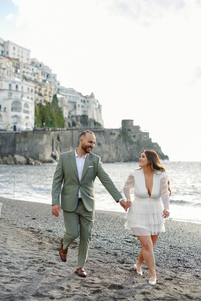 couple running on the Amalfi Coast in italy, amalfi coast wedding photographer, amalfi coast wedding, italy wedding photographer, destination wedding photographer