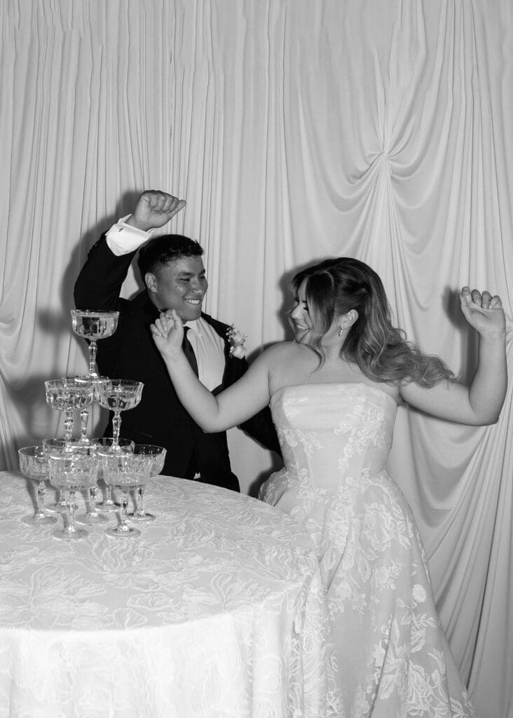 champagne pop photo, editorial wedding photography